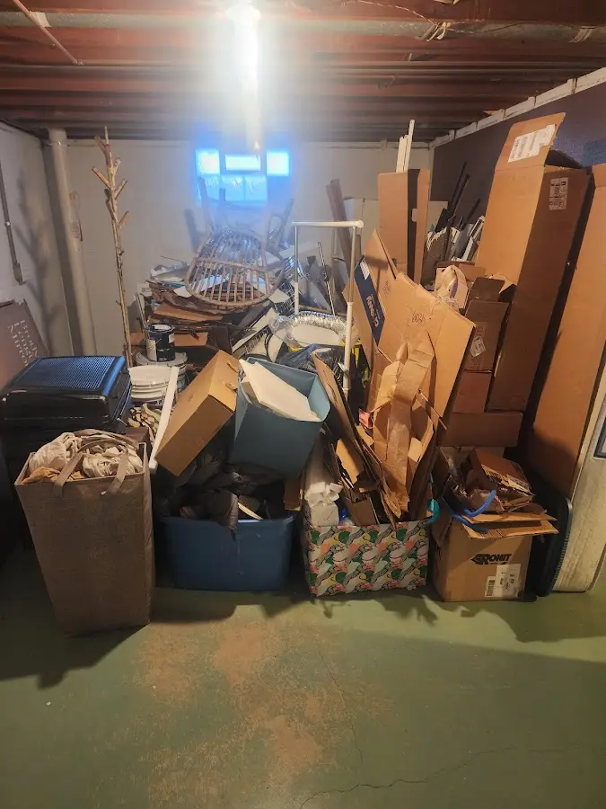 Roll-off dumpster container at job site for 6 Yard Dumpster Rental in Tinton Falls